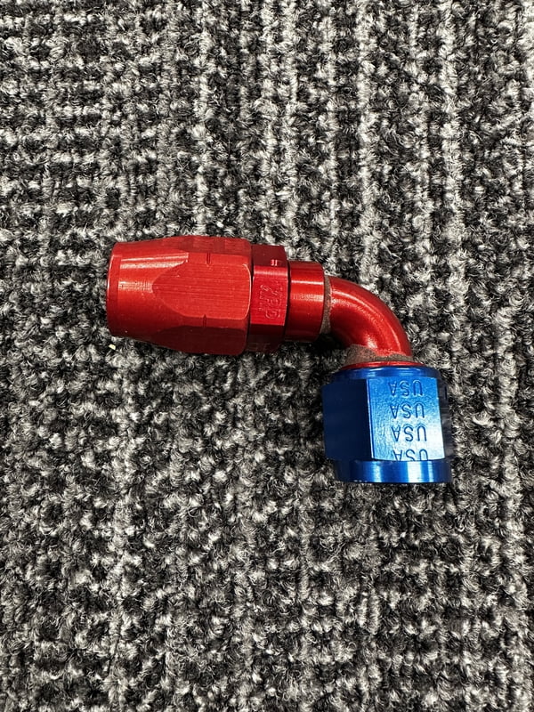 XRP Fitting, #8, -8AN, AN8, 90° Degree, Double Swivel Hose End, Red/Blue